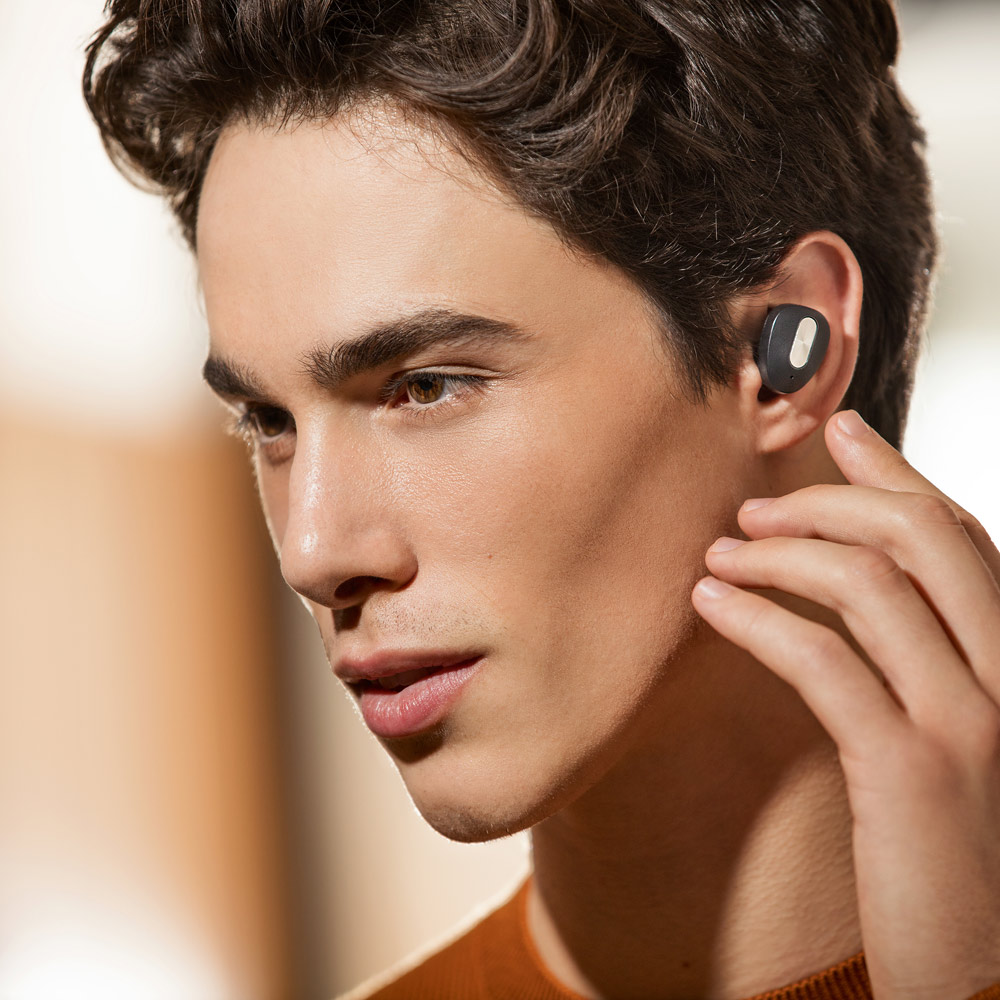 DESCRY. Wireless charger in zinc and Wireless earphones in metal and ABS acrylic